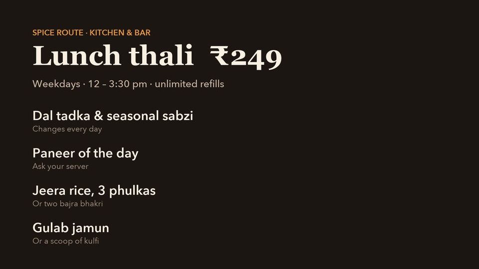 A restaurant TV with the lunch thali board.